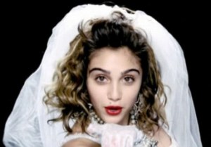 Young Madonna? Nope, its her daughter Lourdes who has a striking resemblance to her mother's 'Like a Virgin' video. 